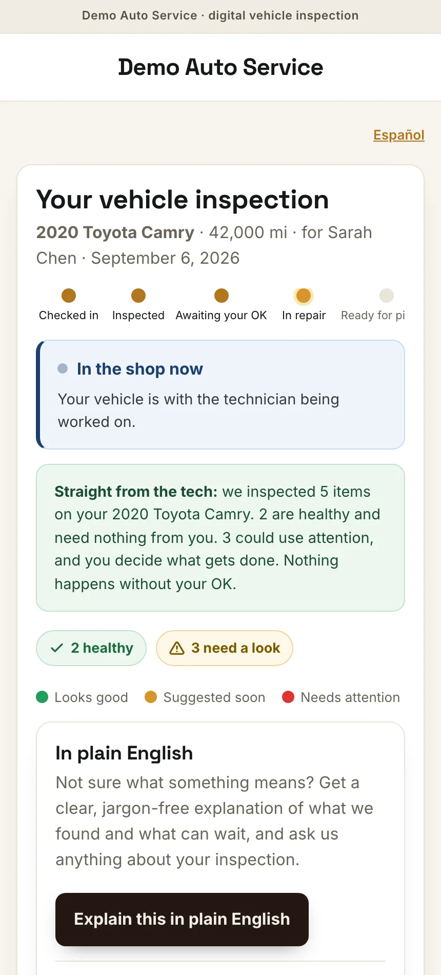 A customer reviewing their digital inspection on a phone